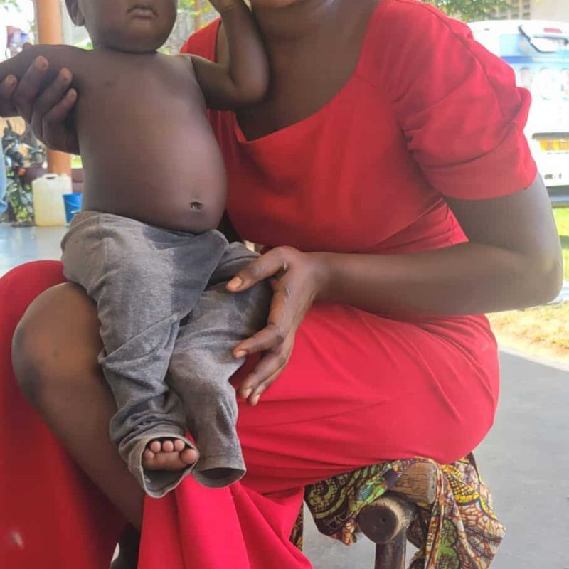 Medical professional helping a patient